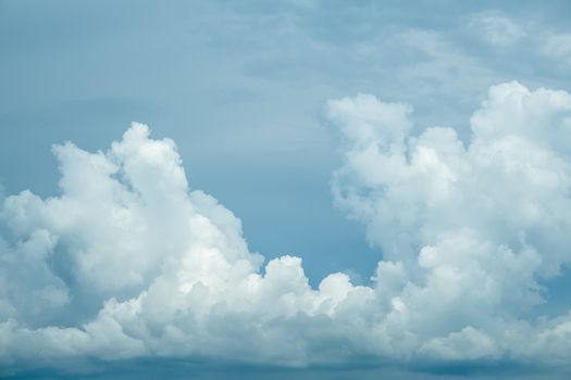 Photo of some white clouds and blue sky cloudscape for background use