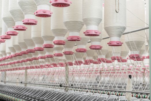 spools of thread at a textile factory