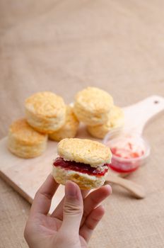 Homemade Cheese Scones with jam strawberry  on the wood Plate