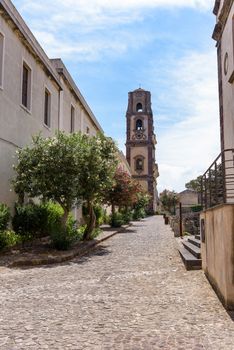 Bell tower of the Lipari Cathedral at the end of the Via Castello street in Lipari town, Aeolian Islands. Italy