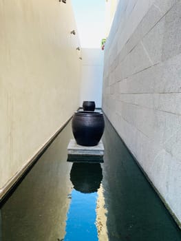 Photo of Black Pot Placed for Building Aesthetics