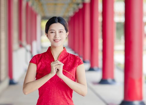 Asian young woman in old traditional Chinese dresses in the Temp