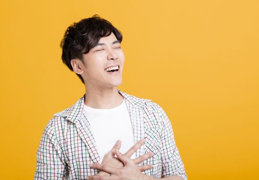 happy Asian young man with laugh face