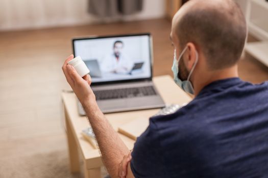 Ill patient in video call with doctor