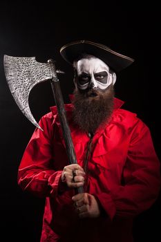 Bearded crazy pirate with his axe