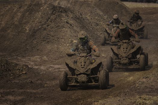 ATV Tour, ATVs in the mud with a big splash
