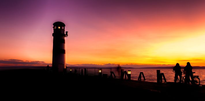 Wonderful Summer Sunset Impression of lighthouse at lake Neusied