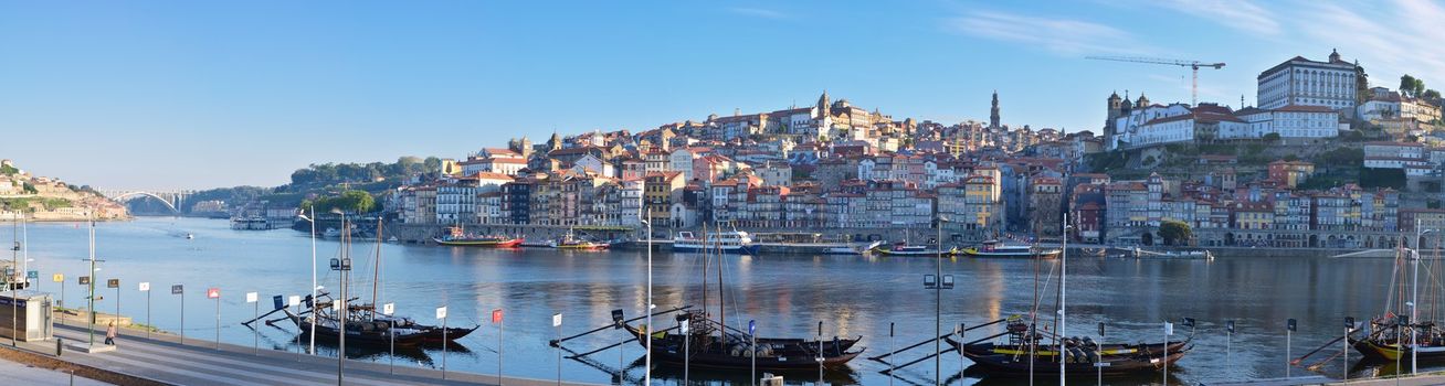  Porto, old town skyline with the Douro river and rabelo boats.