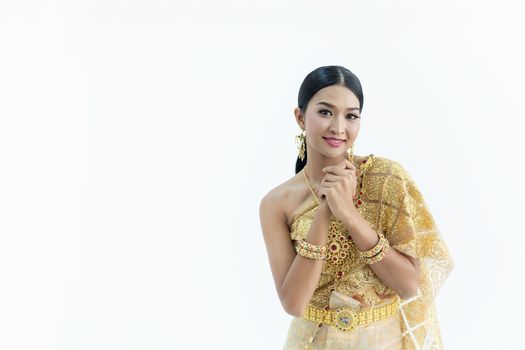 Beautiful Thai women wearing traditional Thai clothes that have a unique Thai culture. Happy asian woman with blank copyspace, isolated on white background