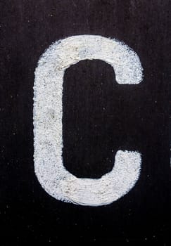 Written Wording in Distressed State Typography Found Letter C