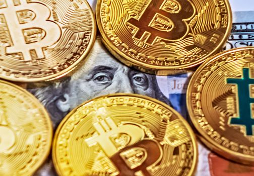 Gold bitcoin coin Macro portrait of Benjamin Franklin of dollar