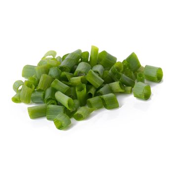 Chopped fresh green onions isolated on white background
