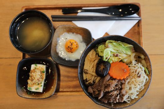 Sukiyaki donburi , sukiyaki hot pot stew with Japanese rice in b