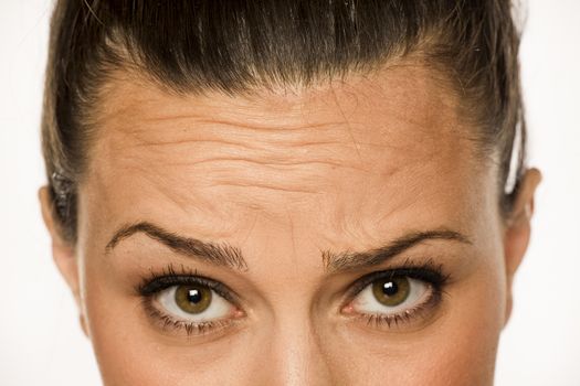 woman showing her forehead wrinkles