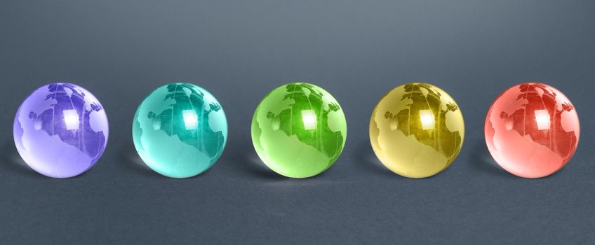 Five multicolored glass globes of planet earth. Globalization and markets. Future forecasts world development. Preservation of the environment. Exoplanets and space exploration. Foreign languages.