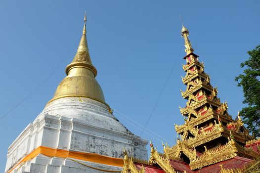 Ancient Pagoda at Wat Phra Kaew Don Tao Temple in Lampang Province, Thailand.