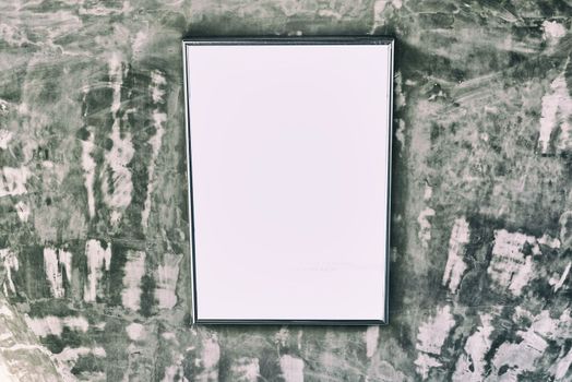 Blank Frame on Concrete Wall.