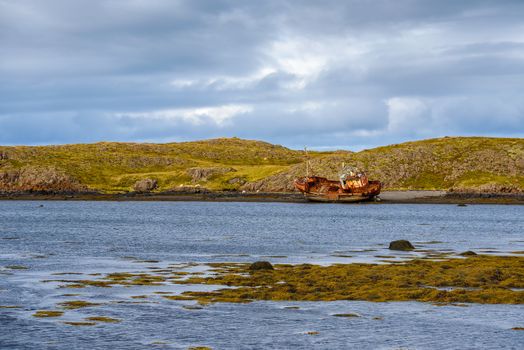 Fishing ship wreck laying on the Snaefellsnes peninsula in Iceland