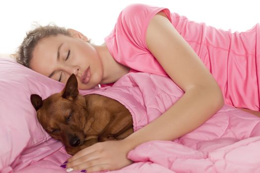 beautiful girl sleeping with her little dog