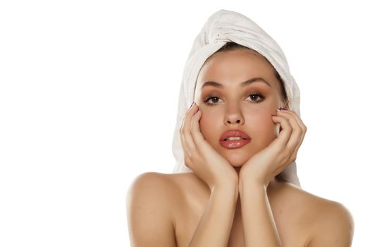 beautiful young woman with a towel on her head