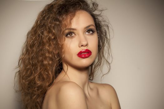 young woman with curly hair