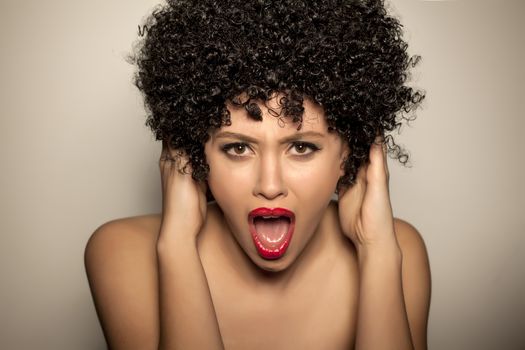 woman with black curly wig