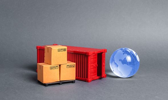 Red cargo container with boxes and blue planet earth glass ball. Business and industry, transport infrastructure. The concept of commerce and trade, delivery, exchange of goods. Globalization