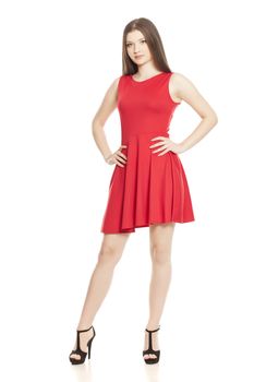 Young woman in short red dress and high heels