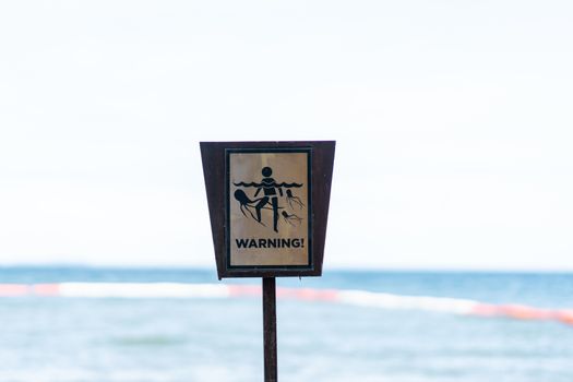 Warning sign, Beware about jellyfish on the beach.
