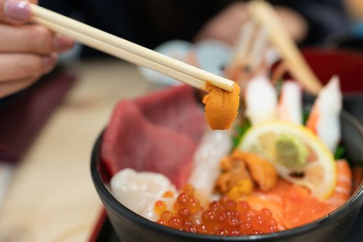 Kaisen Don (Sashimi seafood Rice Bowl) served in a black Bowl, J