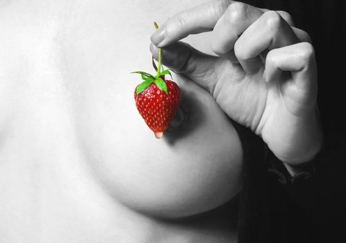 Woman closeup naked with strawberry