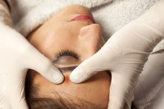 cosmetic treatment of the forehead