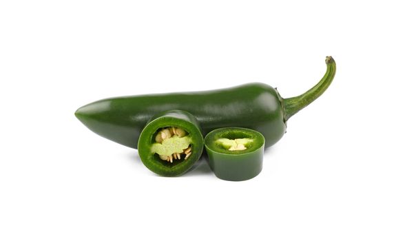Close up one cut green jalapeno pepper isolated