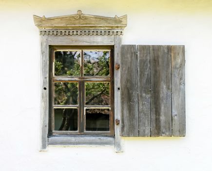 Detail of a window of a typical ukrainian antique house
