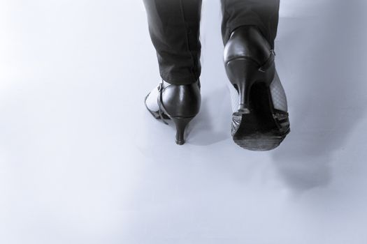 Feet of adult woman. Salsa dancer