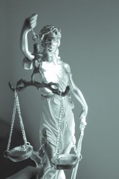 Woman statue symbol of justice Themis