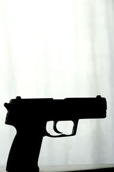 Firearm in silhouette