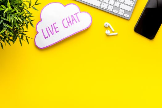 Live chat conversation message concept. Office desktop top view