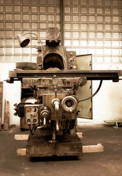old ironworks machine in retro fashioned frame