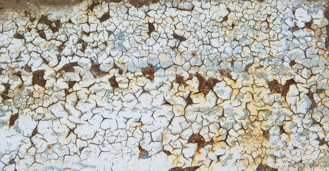 Heavy erosion metal texture faded blue color, abstract grunge background. Weathered rust metal texture background with erosion surface.