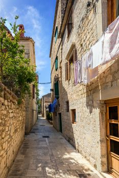 Narrow street in historic town Trogir, Croatia. Travel destinati