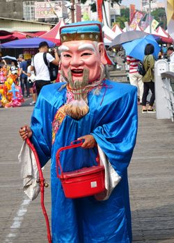 Man Disguised as Chinese God of Wealth