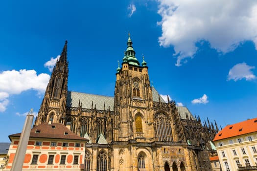 Prague, bell gothic towers and St. Vitus Cathedral. St. Vitus is
