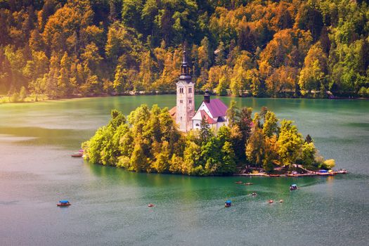 Autumn view on Bled Lake with Pilgrimage Church of the Assumptio