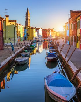 Beautiful view of the canals of Burano with boats and beautiful,