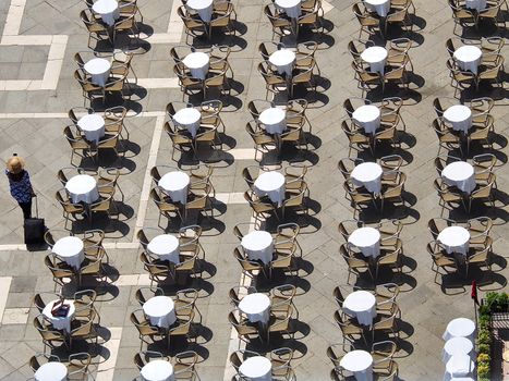 Aerial view of empty tables and chairs in Venice