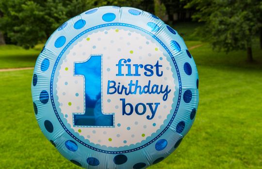 first birthday boy text on ballon