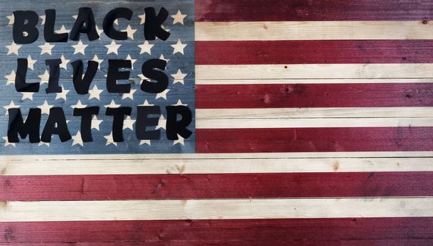 Black lives matter concept on United States vintage wooden flag 