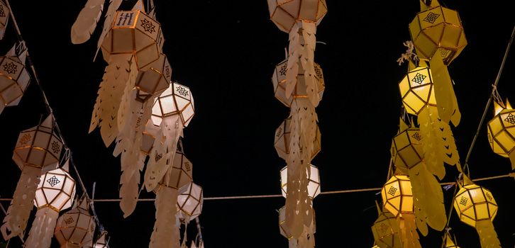 Light from Thai lanna lanterns background at night in Yi Peng Festival.