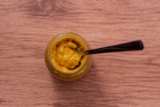 Mustard in jar shot from directly above